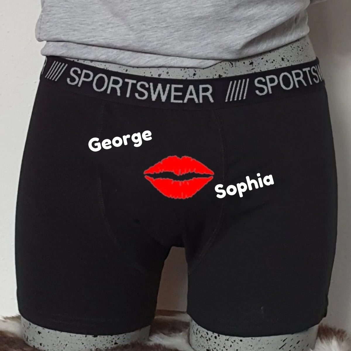 Zwarte boxershort met rood mondje en twee namen, van FlexMade