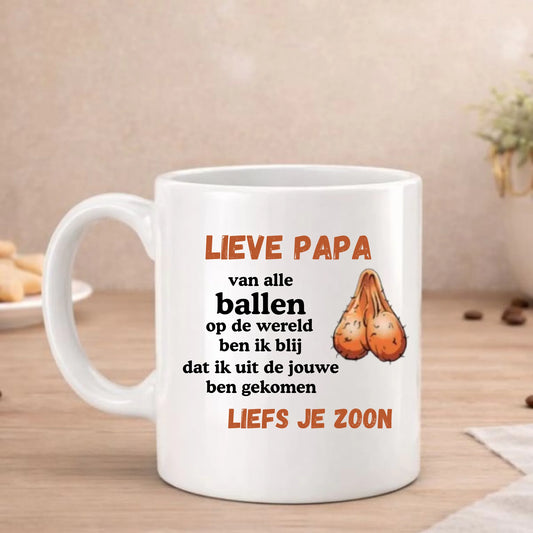 Van alle ballen beker met de tekst Lieve papa, van alle ballen op de wereld ben ik blij dat ik uit de jouwe kom, FlexMade