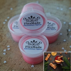 Christmas Spice geuren: bakjes waxmelts van FlexMade met het etiket Christmas Spice, met een foto van glühwein