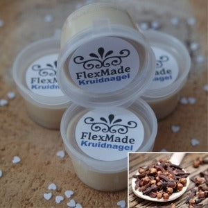 Kruidnagel geuren: bakjes waxmelts van FlexMade met het etiket Kruidnagel, met een foto van kruidnagels