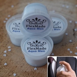 Pepernoten geuren: bakjes waxmelts van FlexMade met het etiket Aqua Men en een foto van een man met parfum