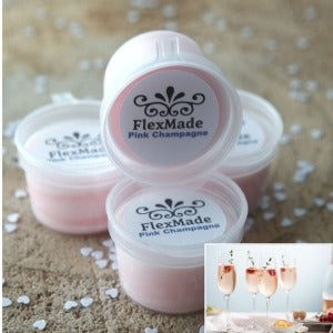 Pink Champagne geuren: bakjes waxmelts van FlexMade met het etiket Pink Champagne, met glazen roze champagne
